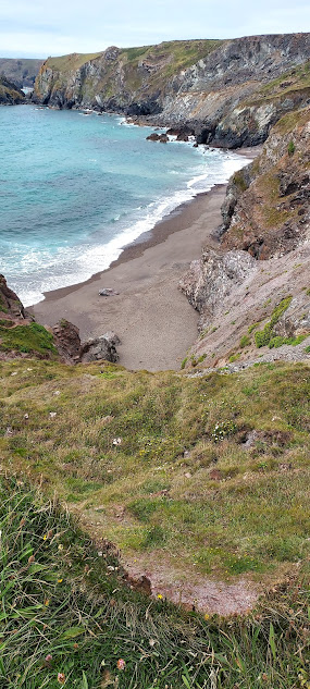 Pentreath beach with its perilous descending cliff path