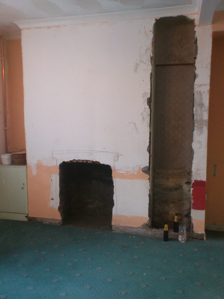 Knocked out fireplace and alcove in renovating a living room
