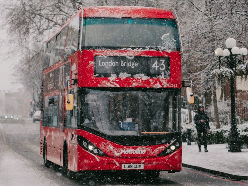 Snowy London bus on a snowy street